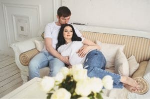 Pregnant wife and husband intimate moment